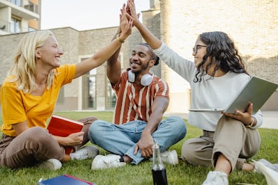 students high fiving-2-1-1