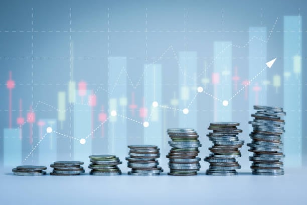 graph showing wage growth with stacked coins growing in size